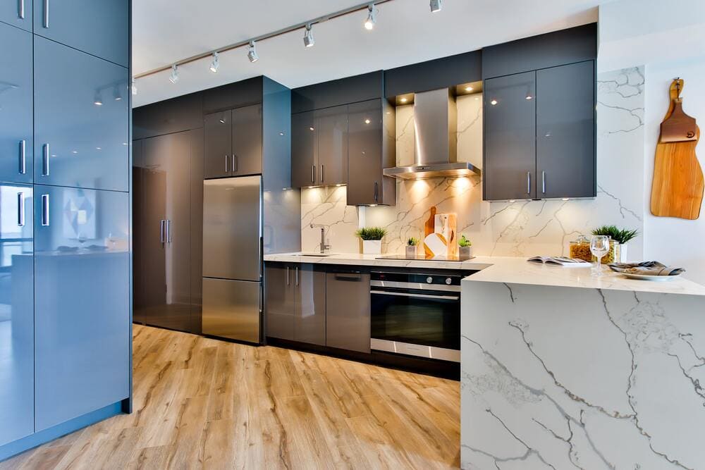 white and black clean marbled kitchen - photo by Unsplash