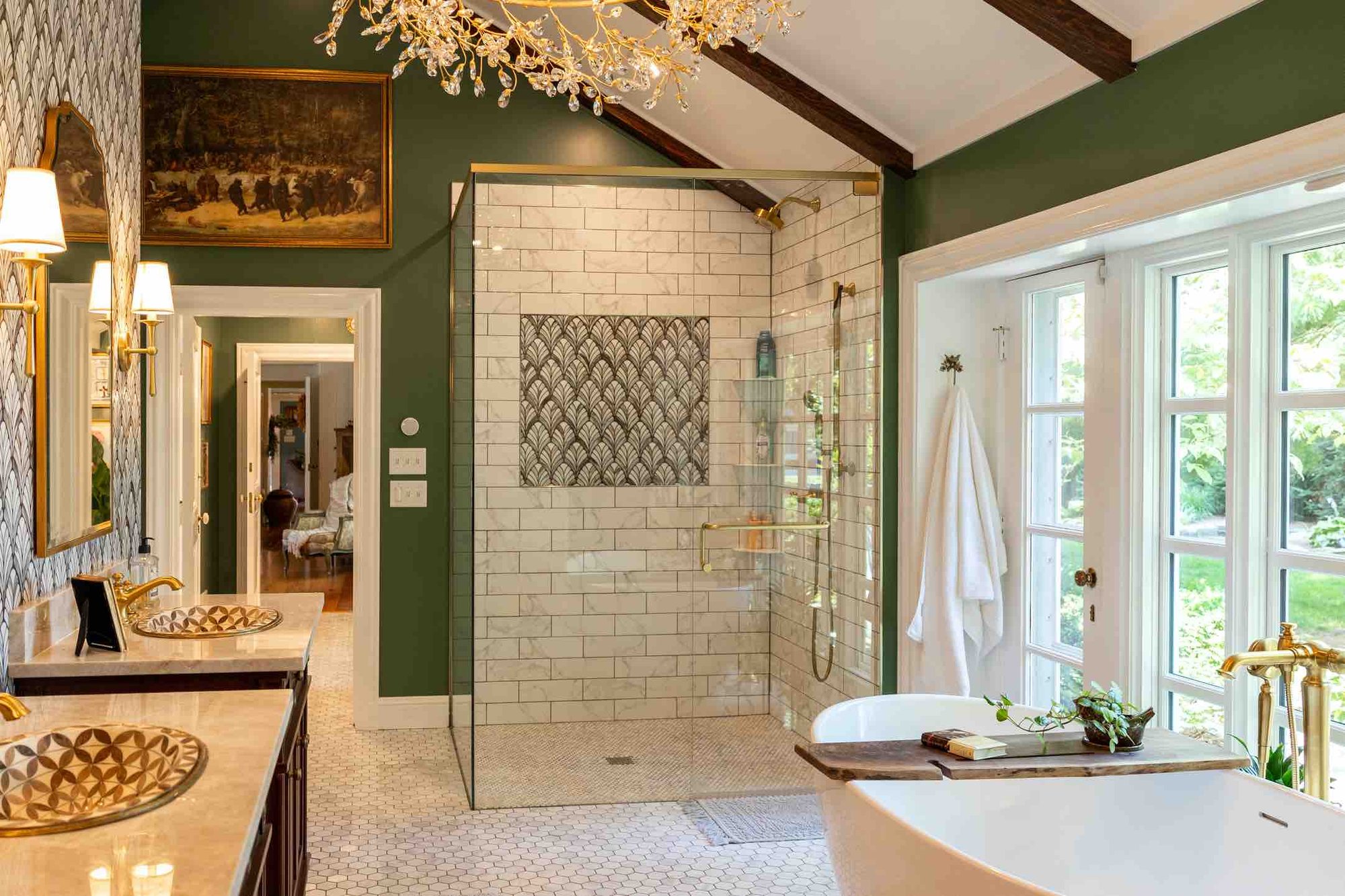 Custom Primary Bath with Green Walls, Walk-in Shower, White Bath Tub, And Double Sink Vanity By True Craft Remodelers Custom Primary Bath with Green Walls, Walk-in Shower, White Bath Tub, And Double Sink Vanity By True Craft Remodelers