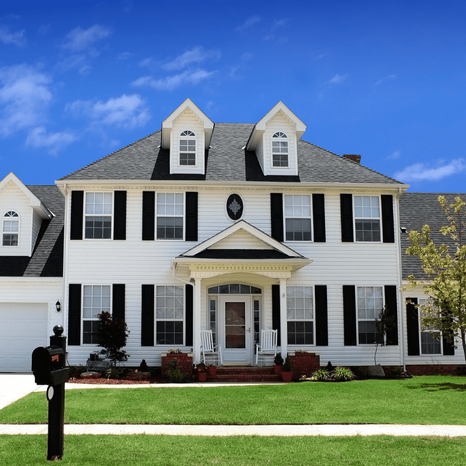 exterior of home with white paneling and garage