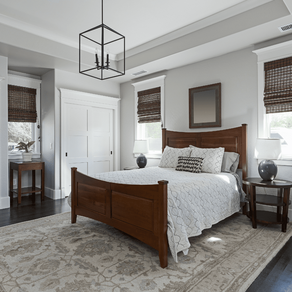 master bedroom with white closet doors stock