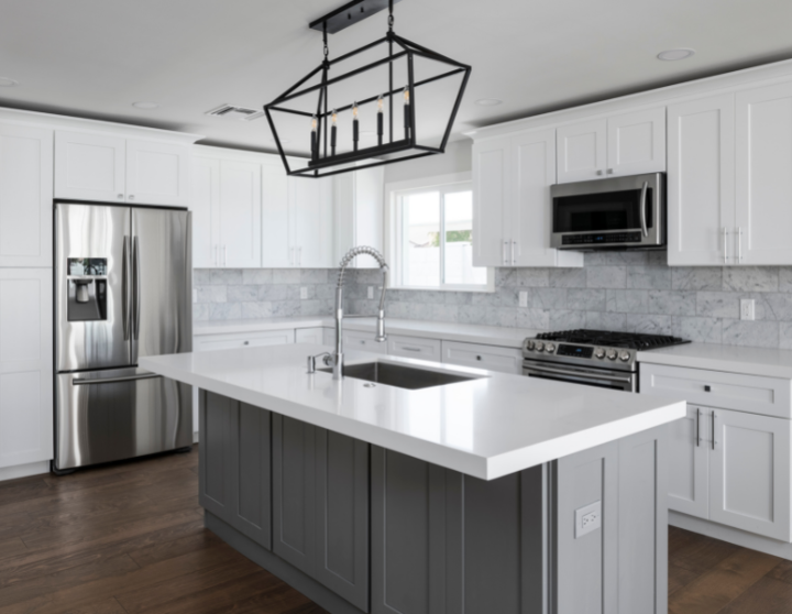 kitchen with white island and hardwood floors kitchen with white island and hardwood floors