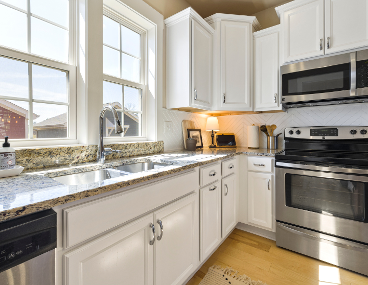 granite countertops with white cabinets