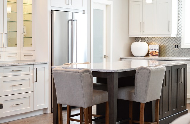 kitchen with grey chairs and island