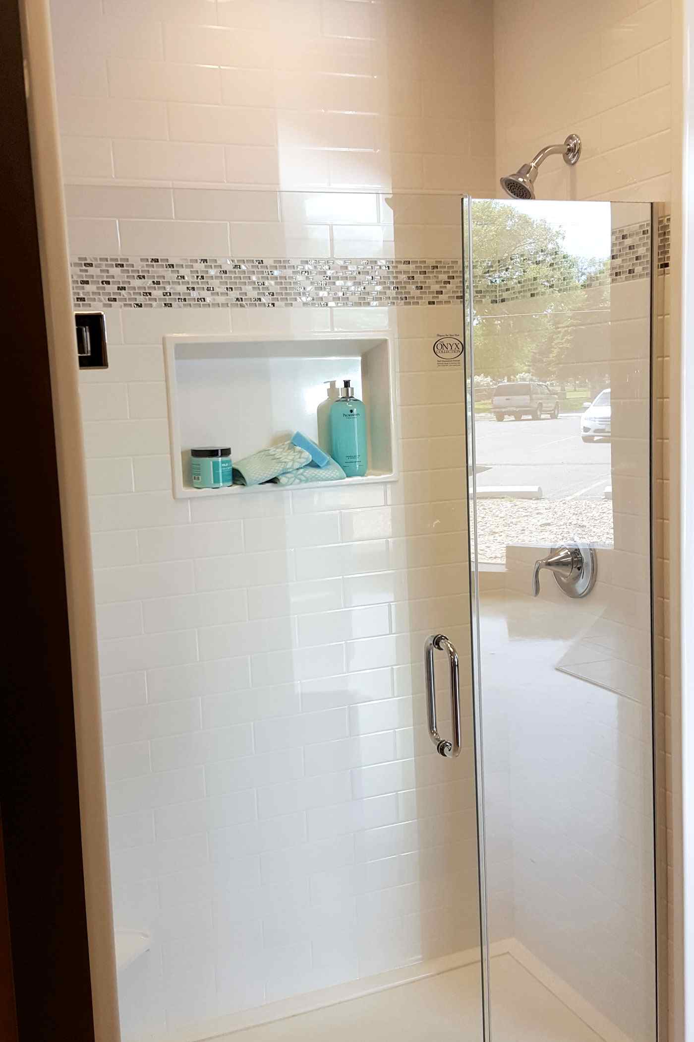 walk in shower with clear glass door by True Craft Remodelers in Illinois