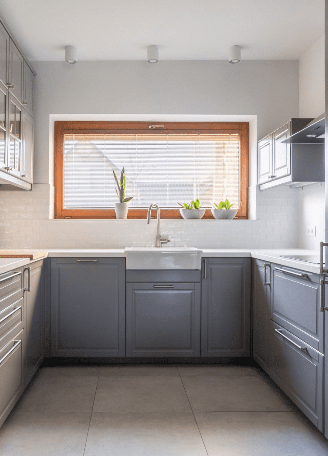 kitchen remodel with sink and grey cabinets