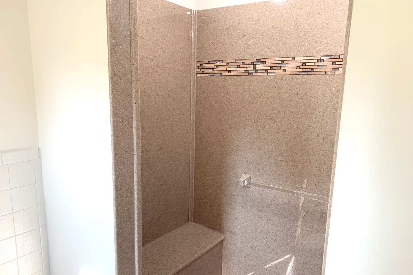 large walk-in shower with glas doors by True Craft Remodelrs in Illinois