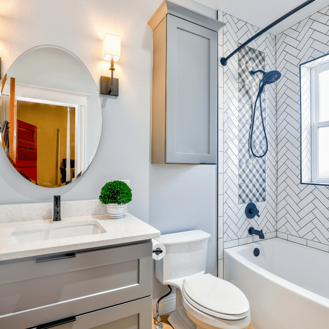 bathroom remodel with white tile shower