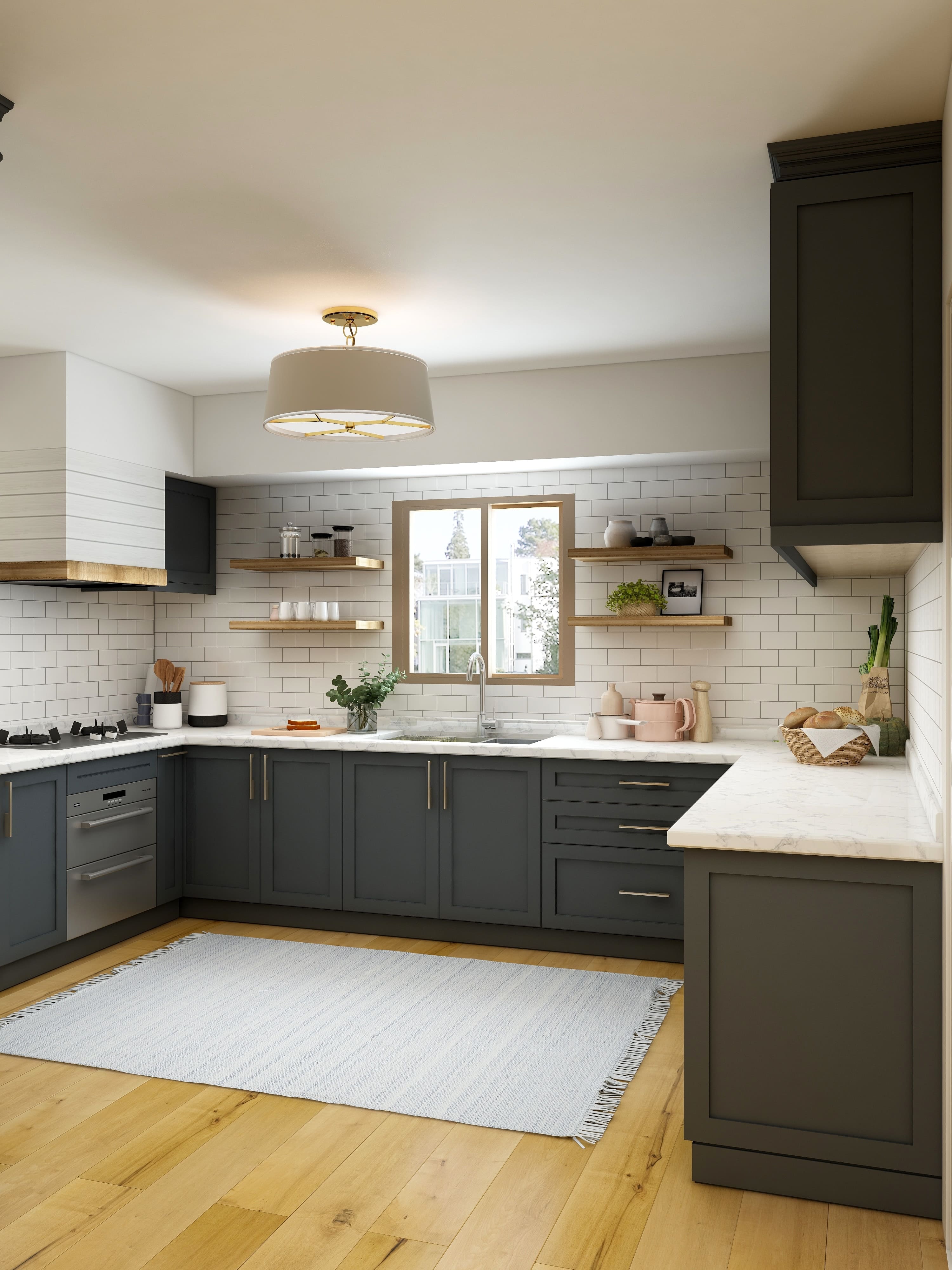 gray kitchen cabinetry with white countertops and brown wood floors - photo by Unsplash