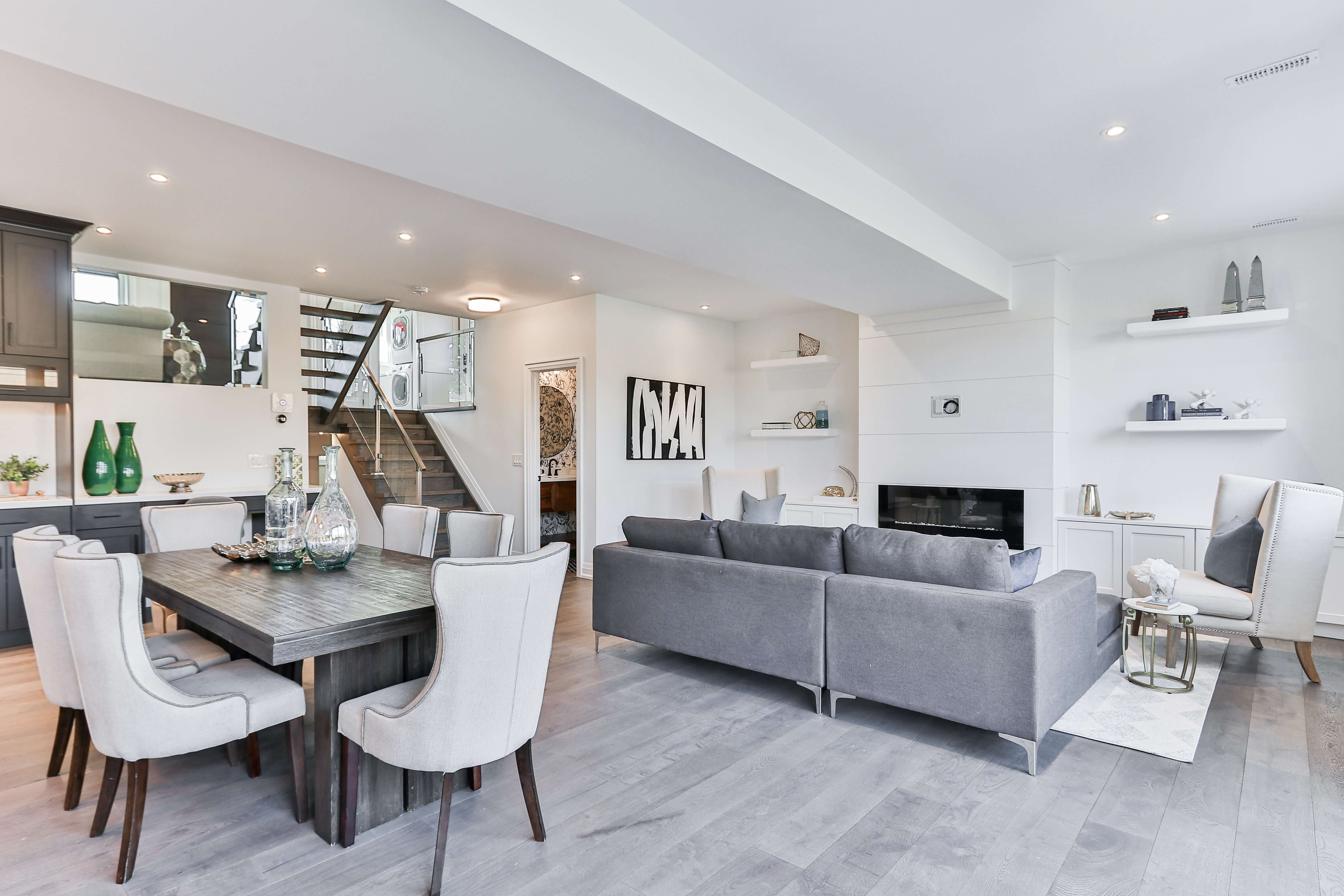 modern home with gray & white dinig room & living room modern home with gray & white dinig room & living room
